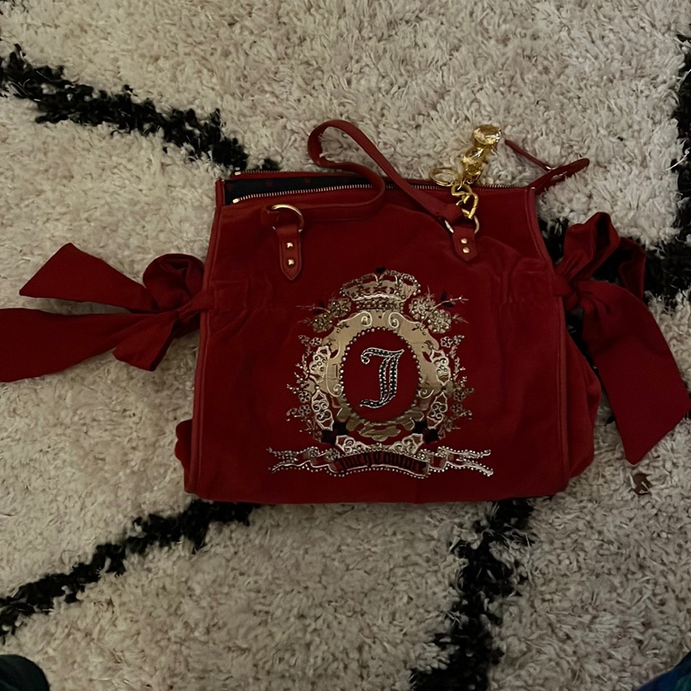 Vintage red Juicy Couture purse. With gold accents and heel keychain.
